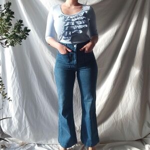 Light blue ruffled shirt